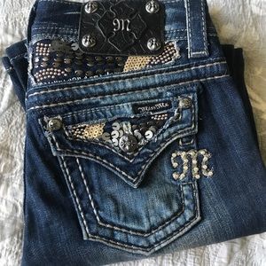 Miss Me boot cut blue denim jeans.